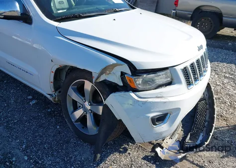 2014 Jeep Grand Cherokee Overland z USA, uszkodzony, nr VIN 1C4RJECG9EC331417